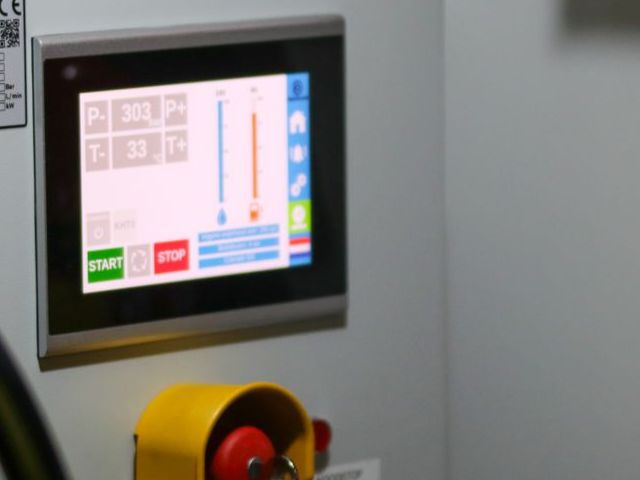 Touchscreen temperature controller panel with emergency stop